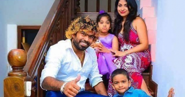 Malinga with his wife and kids